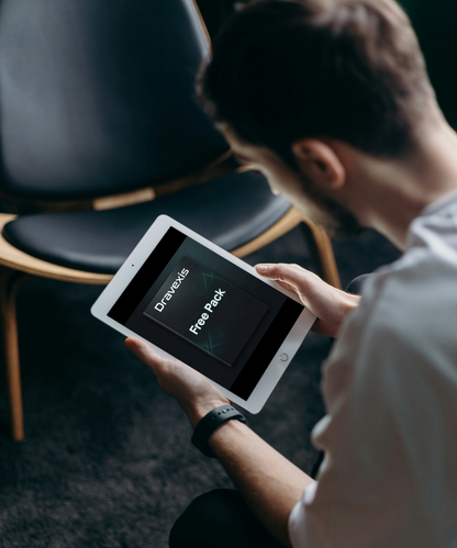 Person using a tablet with 'Dravexis' app on a dark background