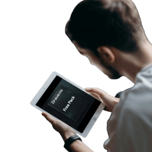 Person using a tablet with 'Dravexis' displayed on the screen against a dark background